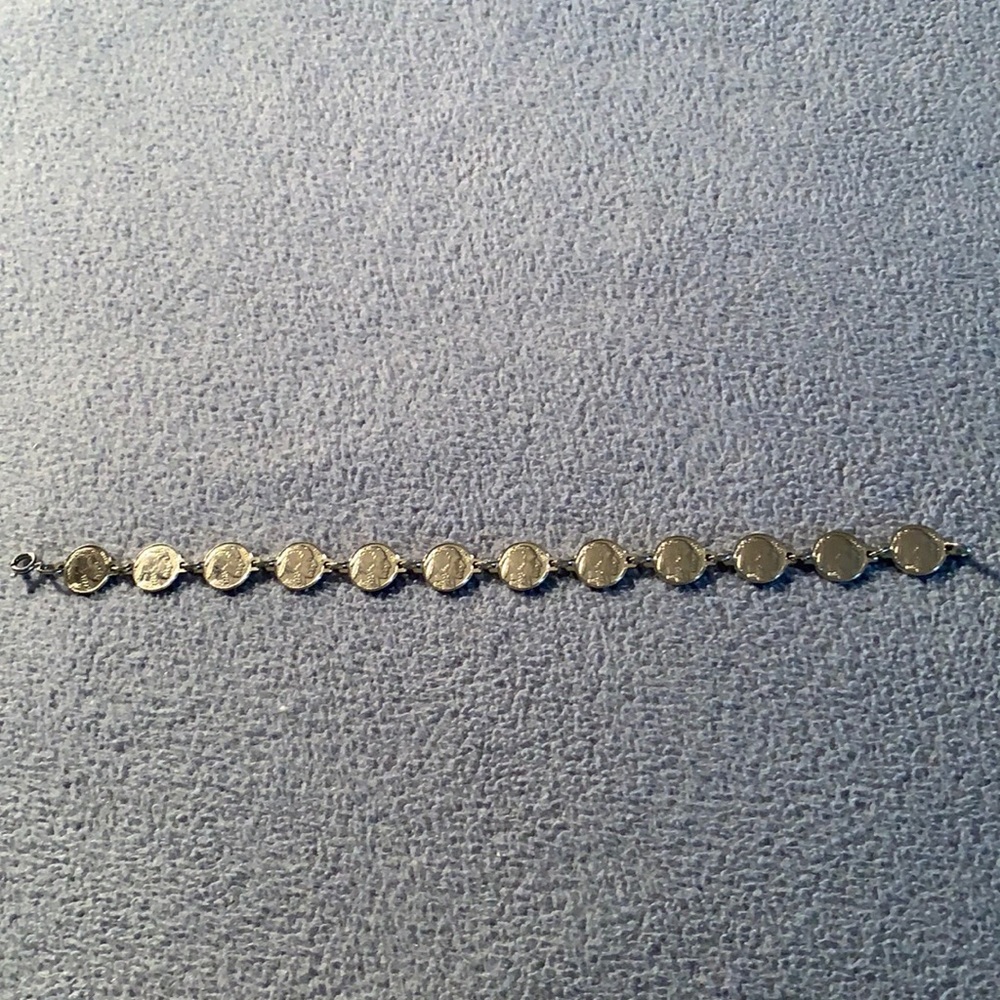 Silver Towne coin (nickel) bracelet.